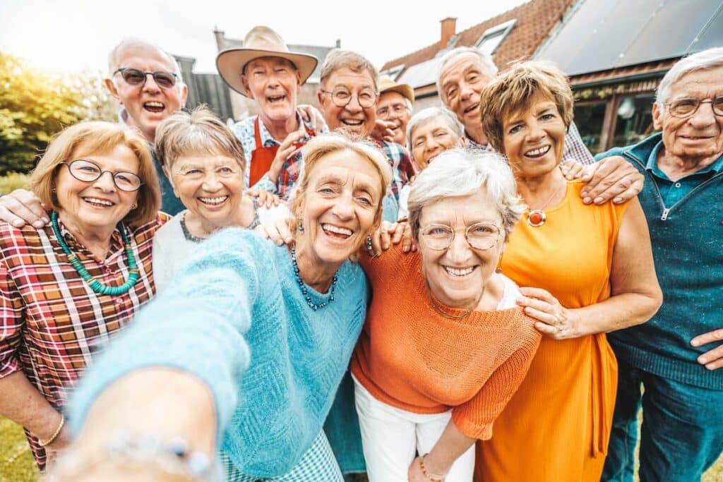 Group of seniors taking a selfie together