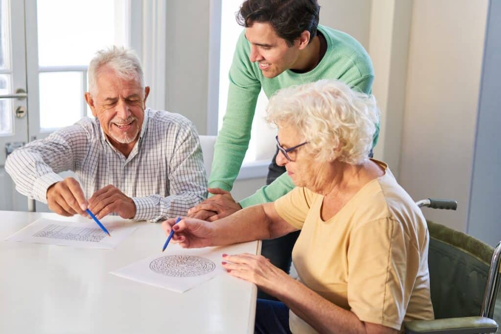 Caregiver talking to older adults