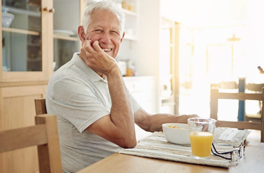 Single retiree enjoying breakfast.